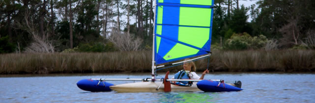 BSD Batwing sail rig and Boss outriggers on small kayak